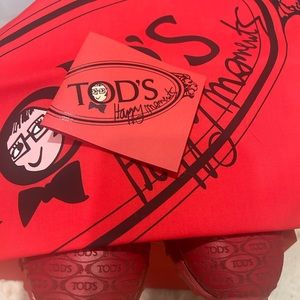 Todd’s red ballet shoes